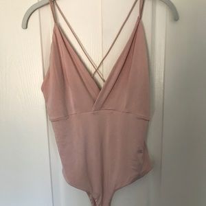 Pale pink bodysuit